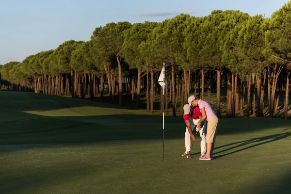 Muž golf instrukce — Stock fotografie