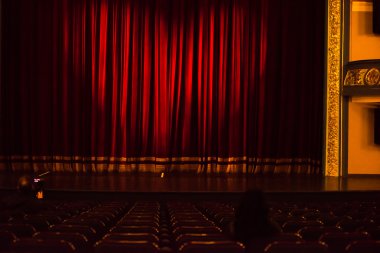 stage curtain or drapes red background clipart