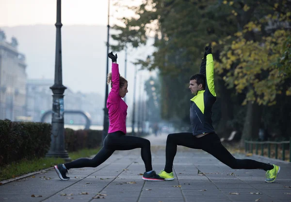 Çift jogging önce ısınma — Stok fotoğraf