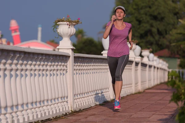 Sportovní žena jogging — Stock fotografie