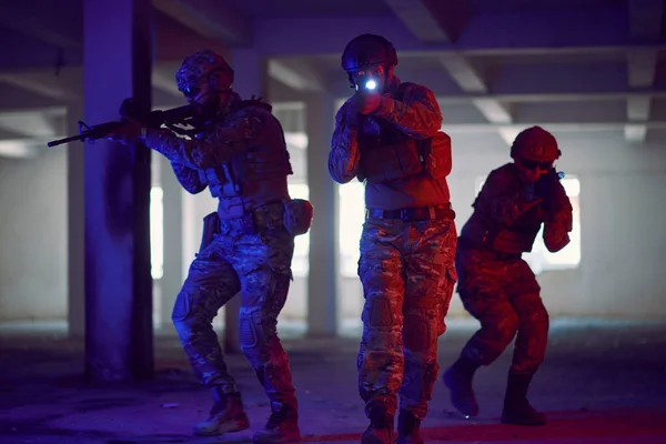 Soldiers squad in tactical formation having action urban environment — Stock Photo, Image