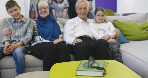 Several generations portrait of happy modern muslim family before iftar dinner during ramadan feast at home — Stock Video