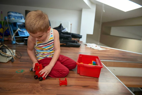 Little boy child playing with creative toys — Stock Photo, Image