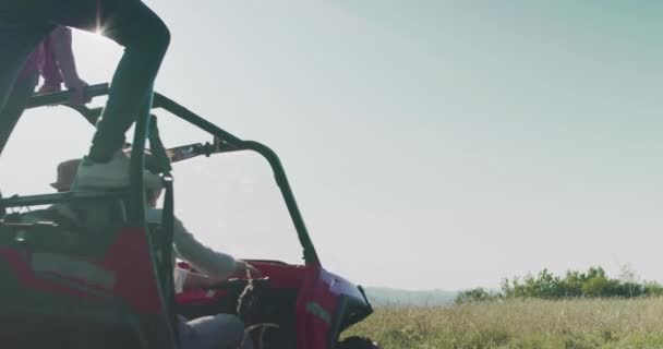 Hipster friends On Road Trip Driving In Convertible Car off road in nature and having fun — Stock Video