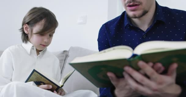 Muslim Father Son Reading Quran Ramadan — Stock Video