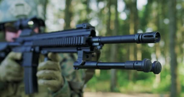 Close Solider Using Assault Rifle While Protecting Military Base Forest — Stock Video