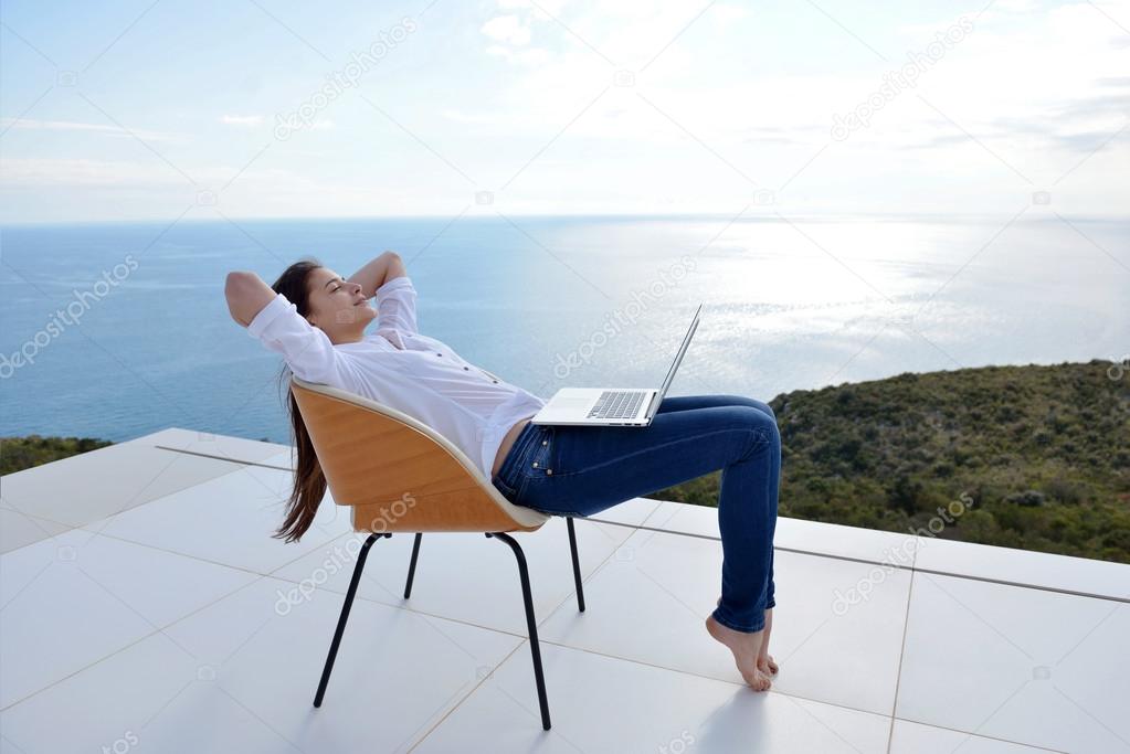 Woman working on laptop computer