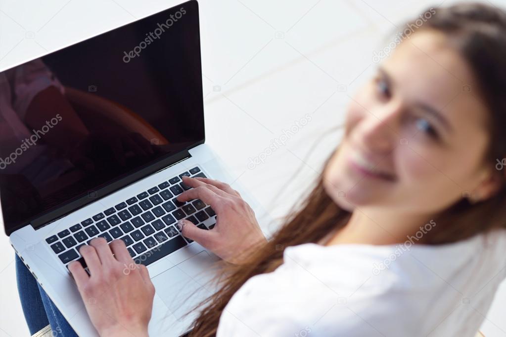 Woman working on laptop computer