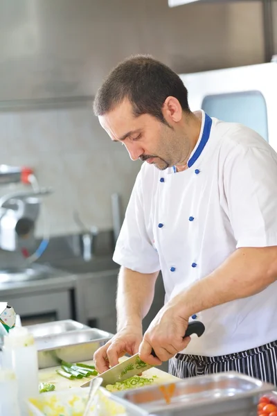 Chef cooking at kitchen — Stock Photo, Image