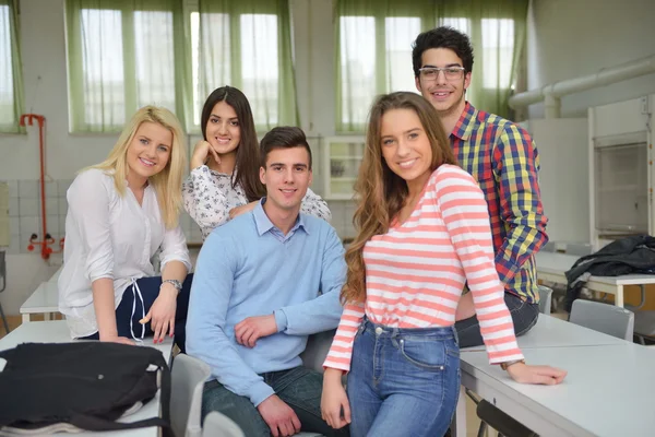 Happy teens group in school — Stock Photo, Image