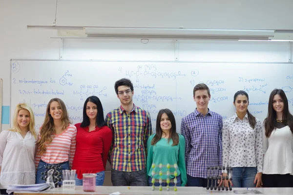 Happy teens group in school — Stock Photo, Image