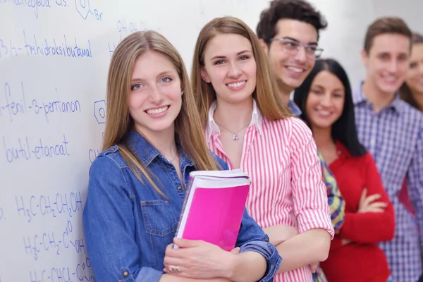 Happy teens group in school — Stock Photo, Image