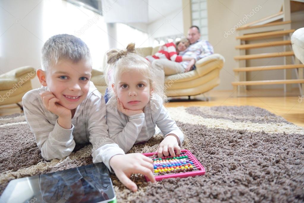 Happy young family at home