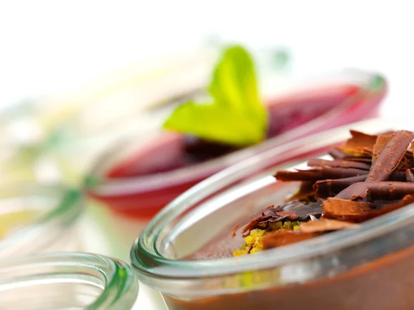 Tasty desserts in glass cups — Stock Photo, Image