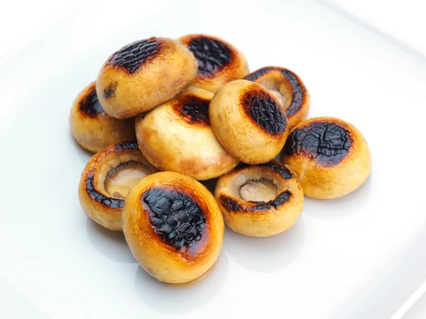 Mushrooms on plate — Stock Photo, Image