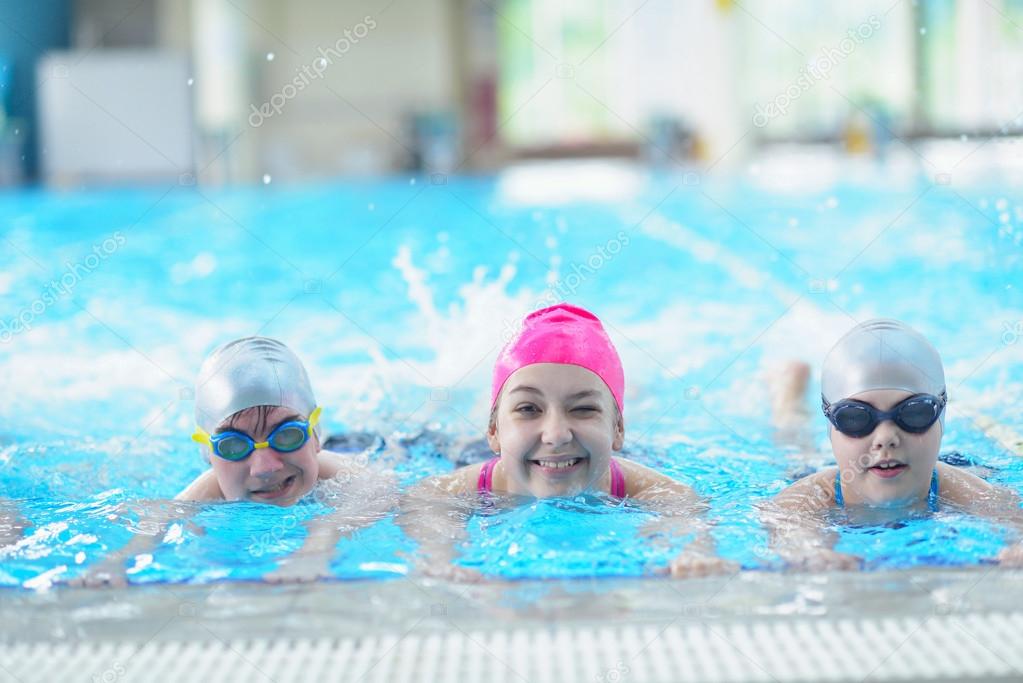 Happy children at swimming pool