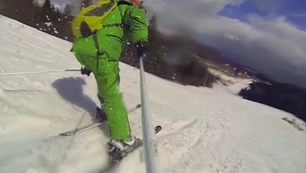 Ski sport, man going downhill with camera — Stock Video