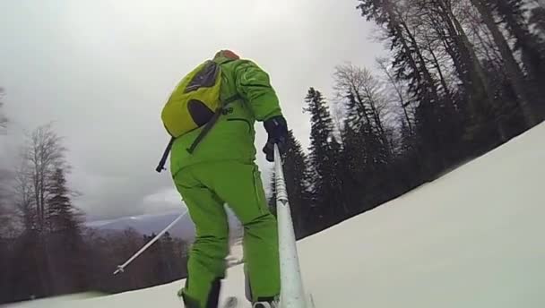 Ski sport, man going downhill with camera — Stock Video