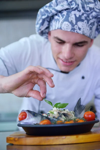 Handsome chef dressed in white uniform — Stock Photo, Image