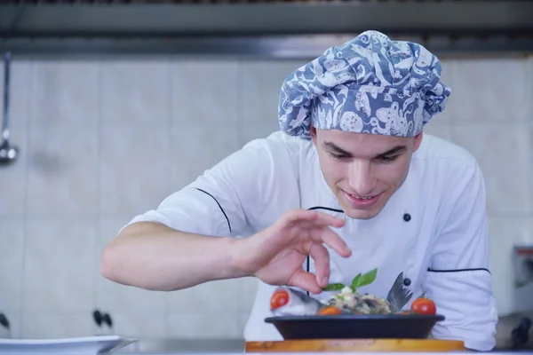 Handsome chef dressed in white uniform — Stock Photo, Image