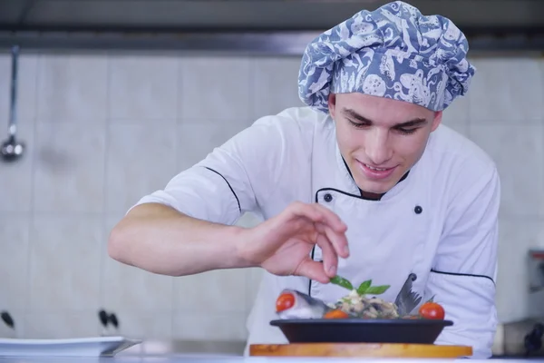 Handsome chef dressed in white uniform — Stock Photo, Image