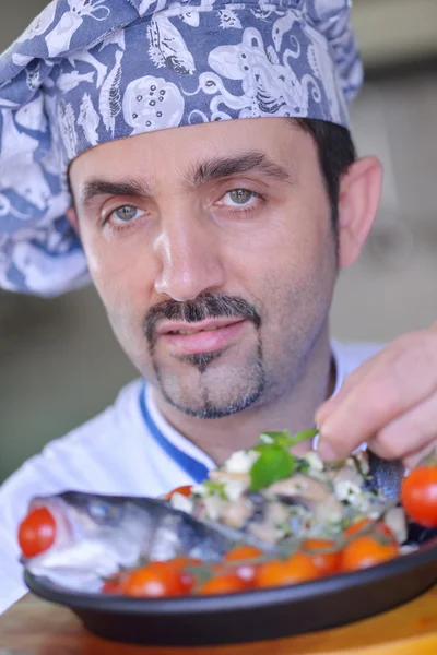 Chef and fish meal — Stock Photo, Image