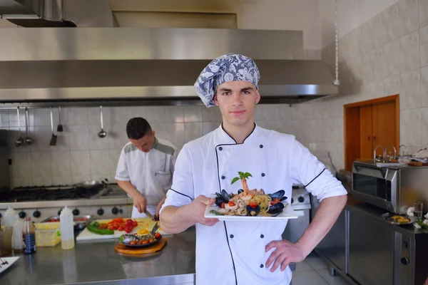 Handsome chef  in white uniform — Stock Photo, Image