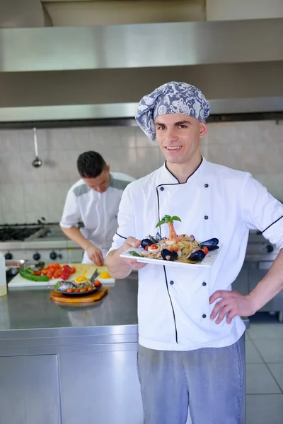 Handsome chef  in white uniform — Stock Photo, Image