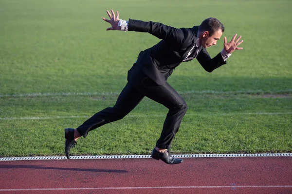 Business man run on track — Stock Photo, Image