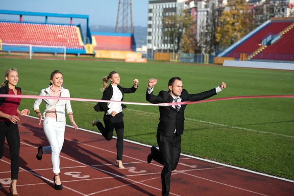 Gente de negocios corriendo en pista de carreras — Foto de Stock