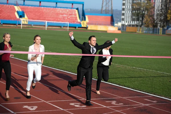 Mensen uit het bedrijfsleven wordt uitgevoerd op track racing — Stockfoto