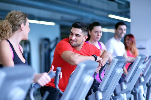 Group of people running on treadmills Royalty Free Stock Images