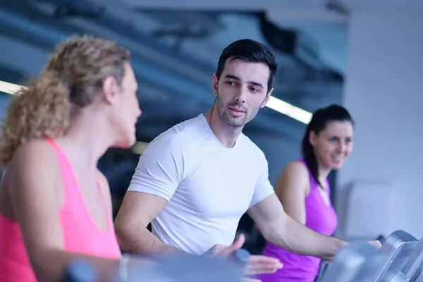 People running on treadmills Royalty Free Stock Images