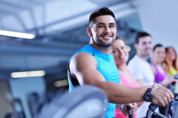 Group of people running on treadmills — Stock Photo, Image