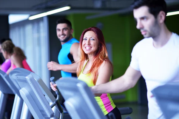 Group of people running on treadmills — Stock Photo, Image