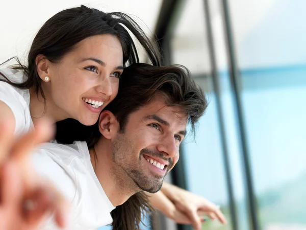 Relaxed young couple at home — Stock Photo, Image