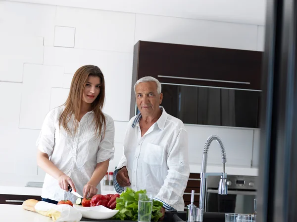 Man and woman at kitchen — Stock Photo, Image