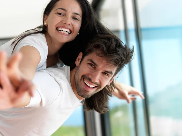 Relaxed young couple at home — Stock Photo, Image