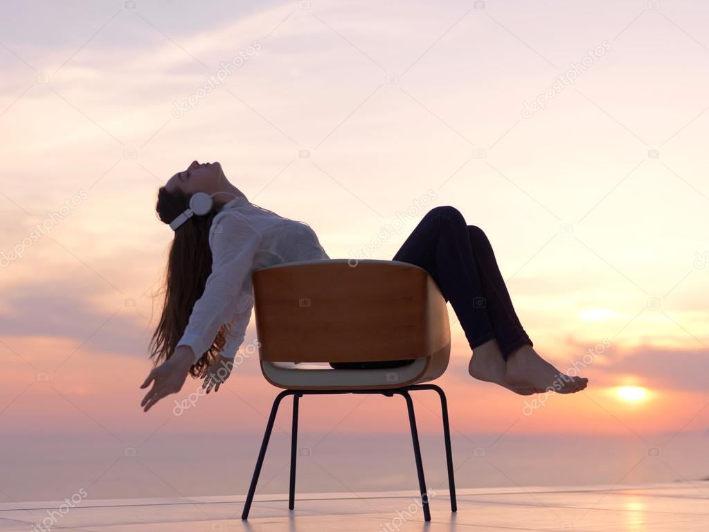 Young woman enjoy sunset