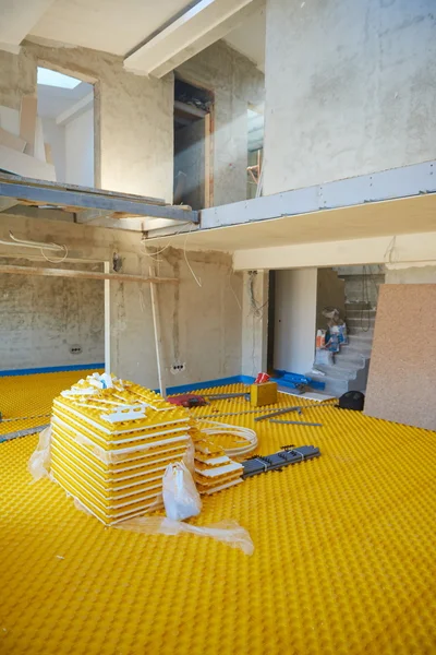 Yellow underfloor heating — Stock Photo, Image