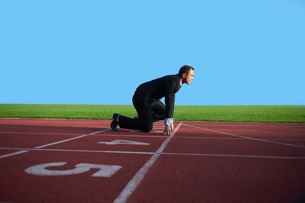 Homem de negócios pronto para correr — Fotografia de Stock