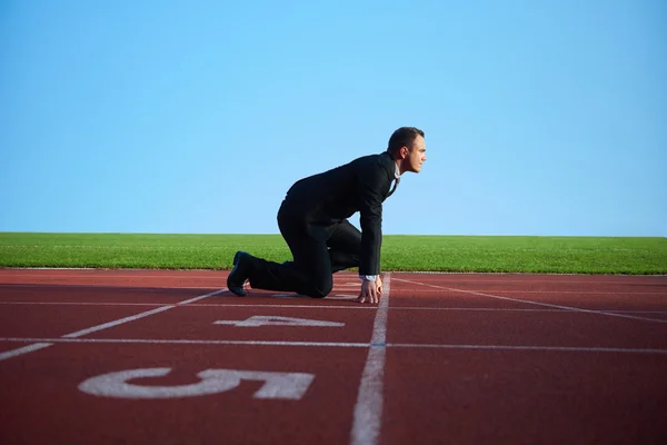 Zakenman klaar om sprint — Stockfoto