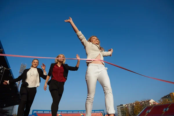 Business people running on racing track — Stock Photo, Image