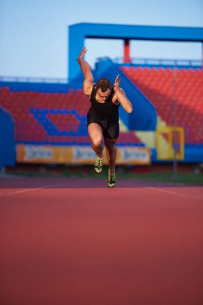 Atletische man start — Stockfoto