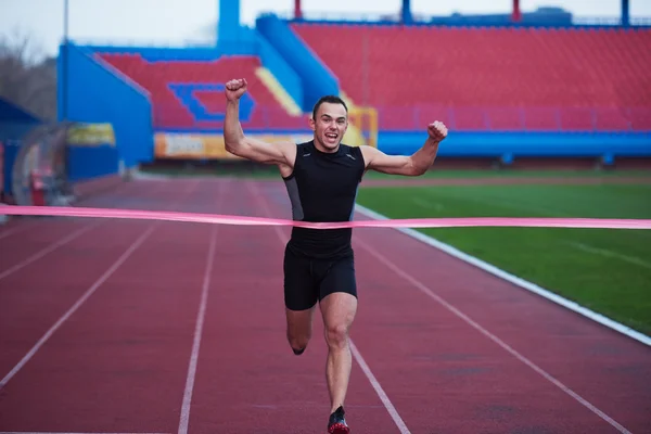 Atletisk runner finis linje spor - Stock-foto