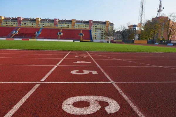 Atletische track in het stadion — Stockfoto