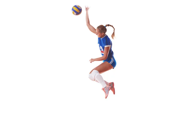 Volleyballerin springt und kickt Ball — Stockfoto