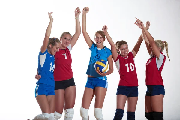 Girls playing volleyball indoor — Stock Photo, Image