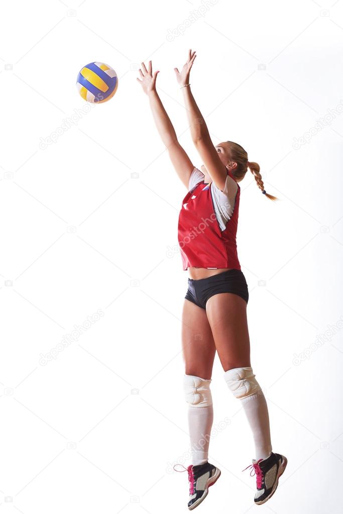 Volleyball woman jump and kick ball