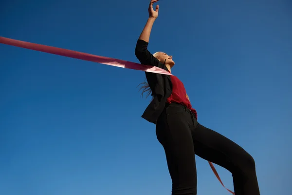 Businesswoman on racing track — Stock Photo, Image